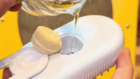 PeluVapor™ – 2 Cepillos Spa para Mascotas Blanco y Naranja